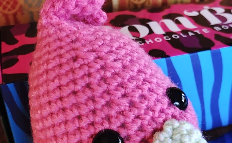 chocolates and a crocheted stuffed animal
