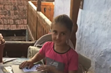 Girl receiving the laptop