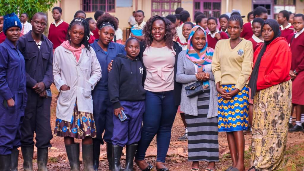 Noel Lutomia (in the middle) with program participants during IDG celebrations