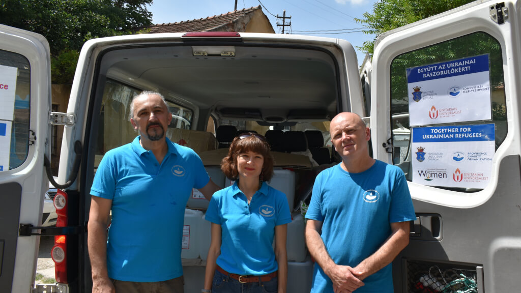 ICUUW Executive Director and Providence Volunteer Zsófia Sztranyiczki with Providence President Rev. Lásló (on the right) and War Refugee and Providence Volunteer Vladimir Skalski (on the left)