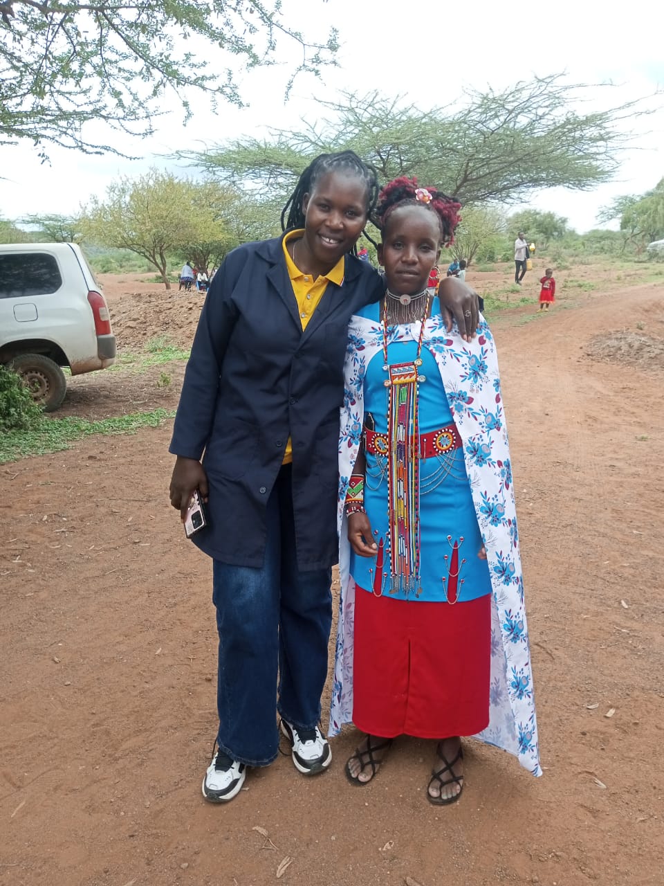 Siro Kwamboka with member of Maasai community